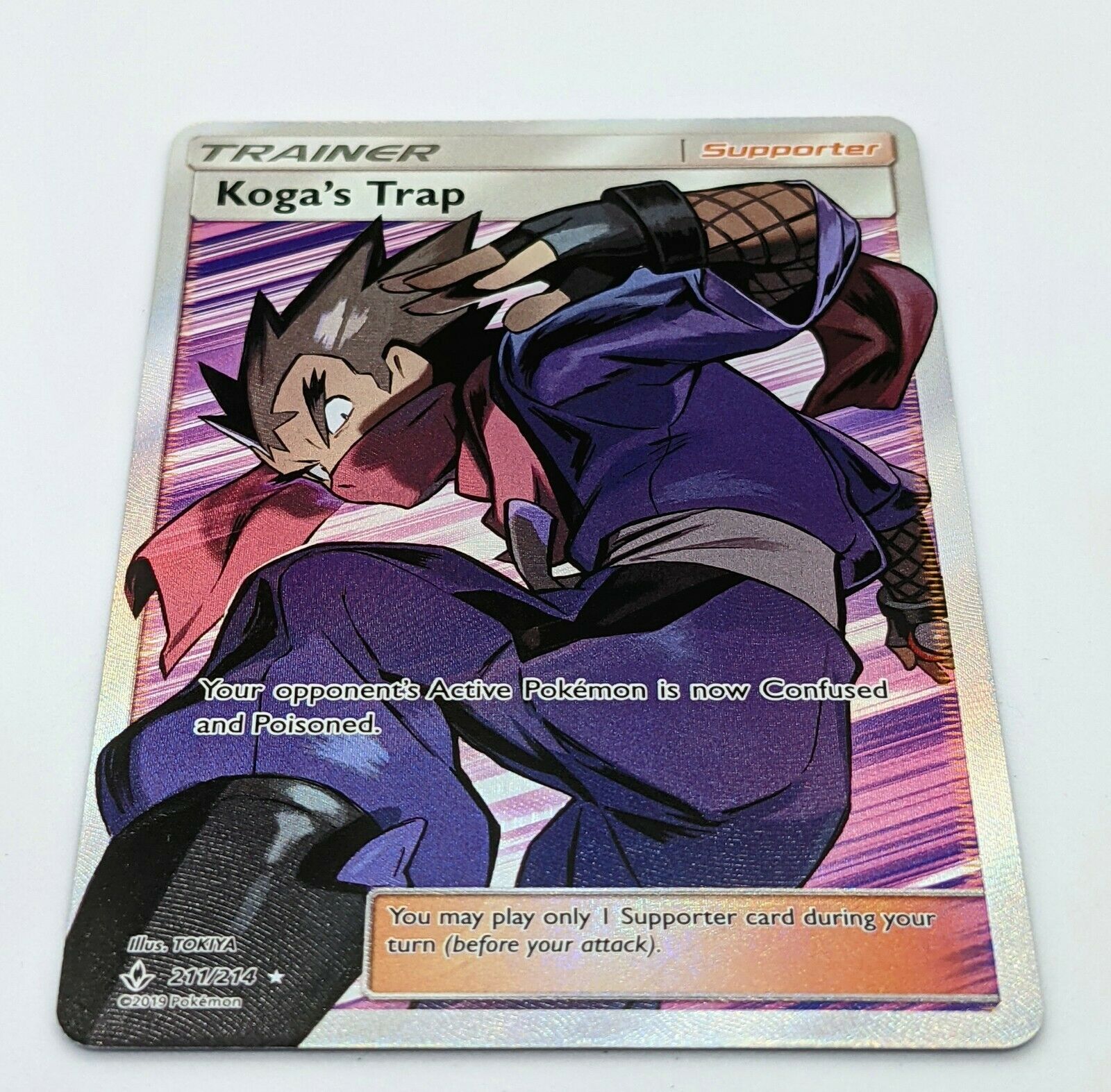 Koga's Trap 211/214 Supporter Unbroken Bonds Full Art Pokemon Card NM/Mint - Image 3